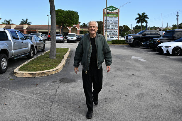 Peter Navarro arrives to speak to the press at the Country Mall Plaza before reporting to federal prison in Miami on March 19, 2024. 