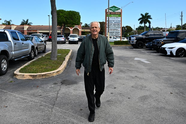 Peter Navarro arrives to speak to the press at the Country Mall Plaza before reporting to federal prison in Miami on March 19, 2024.