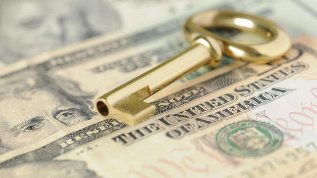 Gold Key to Success over United States Dollars in Cash 