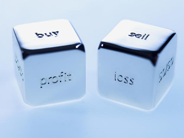 Close up silver cubes with sayings on them 
