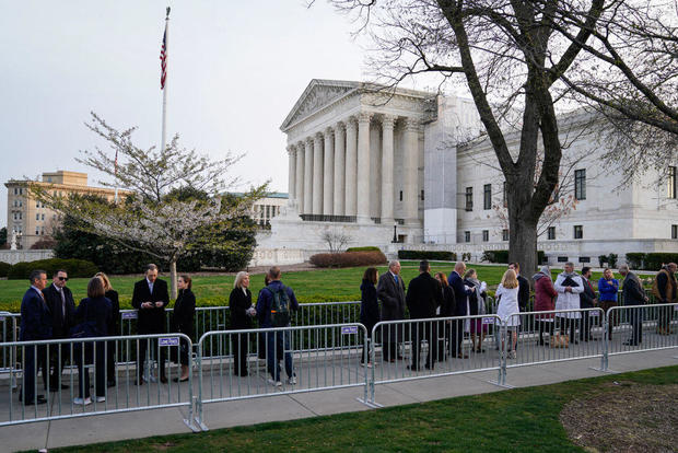 People wait in line outside Supreme Court to hear oral arguments in FDA v. Alliance for Hippocratic Medicine on March 26, 2024, in Washington, D.C. 