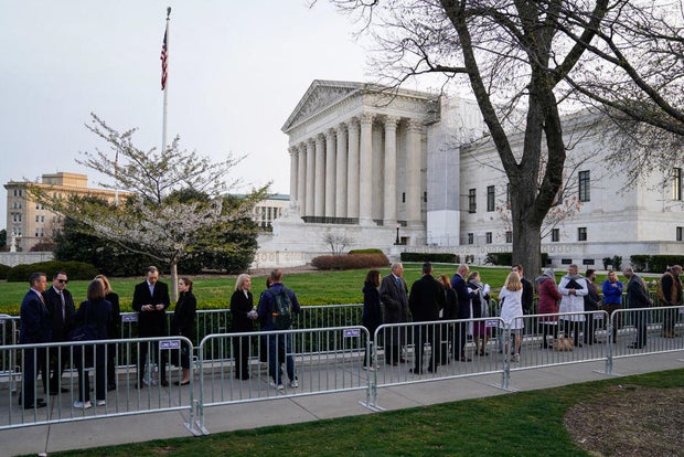 People wait in line outside Supreme Court to hear oral arguments in FDA v. Alliance for Hippocratic Medicine on March 26, 2024, in Washington, D.C.