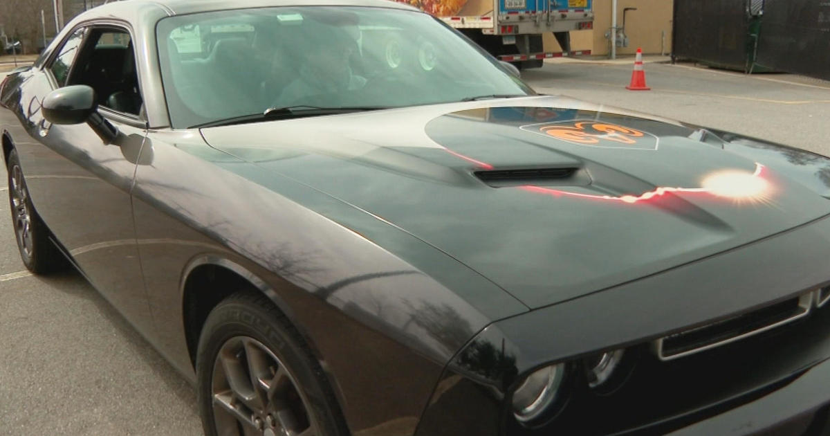 A New Hampshire man customizes a Dodge Challenger to view the solar eclipse without glasses