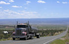 A tanker truck transports crude oil on a highway near Duchesne, Utah, on July 13, 2023. 