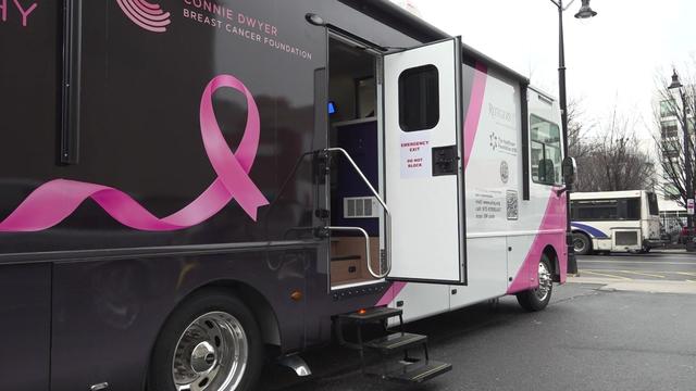 Newark University Hospital's mobile mammogram bus parked in a parking lot. 