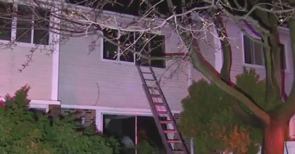 Woman rescued from townhouse fire in north Chicago suburb - CBS Chicago