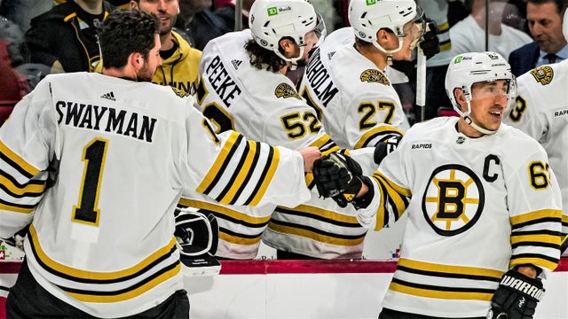 Jeremy Swayman, Brad Marchand 