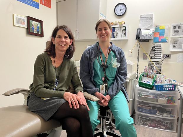 Pediatrician Patricia Braun (left) and registered dental hygienist Valerie Cuzella 