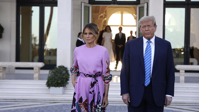 Republican presidential candidate, former President Donald Trump and former first lady Melania Trump arrive at the home of billionaire investor John Paulson on April 6, 2024 in Palm Beach, Florida. 