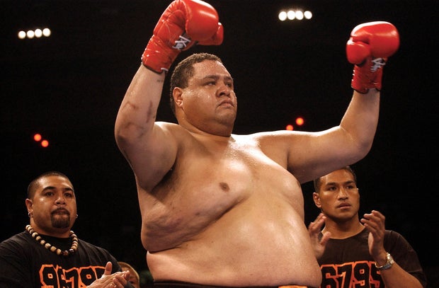FILE PHOTO: Akebono gestures before fighting at K-1 World Grand Prix in Honolulu.