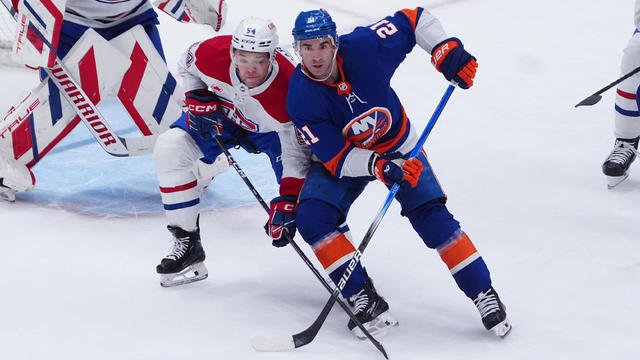 New York Islanders Center Kyle Palmieri (21) battles for position during the first period of the National Hockey League game between the Montreal Canadiens and the New York Islanders on April 11, 2024, at UBS Arena in Elmont, NY. 