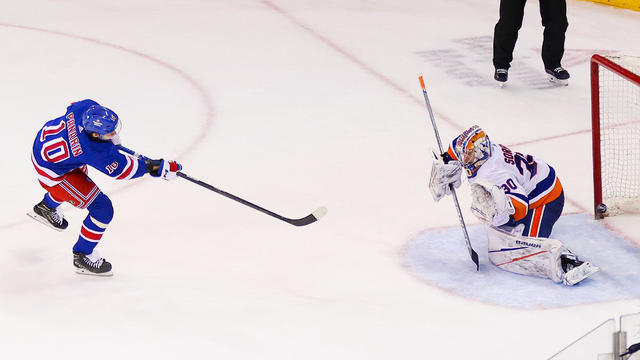 New York Rangers Left Wing Artemi Panarin (10) scores a goal during the shootout in the National Hockey League game between the New York Islanders and the New York Rangers on April 13, 2024 at Madison Square Garden in New York, NY. 