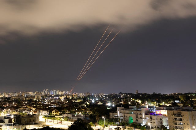 An anti-missile system operates after Iran launched drones and missiles towards Israel, as seen from Ashkelon 