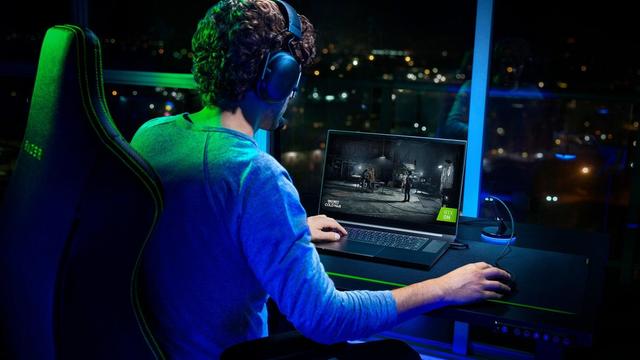 Man using gaming laptop 