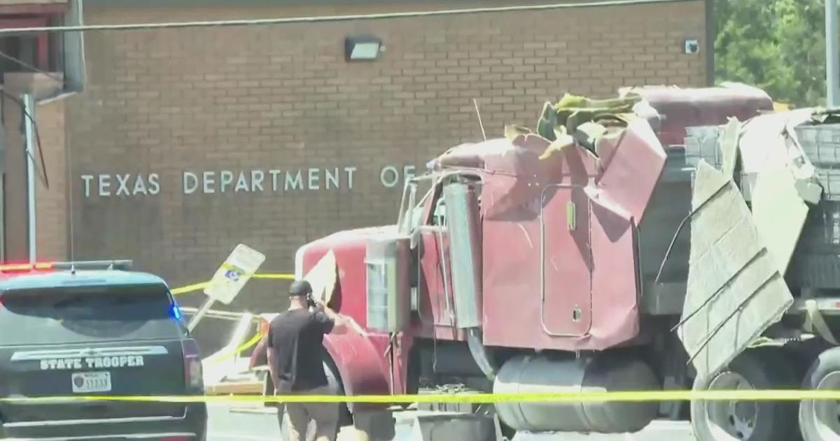 Man arrested for ramming semi-truck into DPS office faces felony charges – CBS News