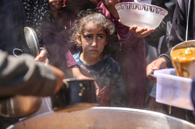 Palestinians Receive Food Rations