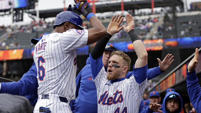Harrison Bader #44 of the New York Mets congratulates Starling Marte #6 of the New York Mets on a two run home run against the Pittsburgh Pirates during the third inning at Citi Field on April 17, 2024 in New York City. The Mets won 9-1. 
