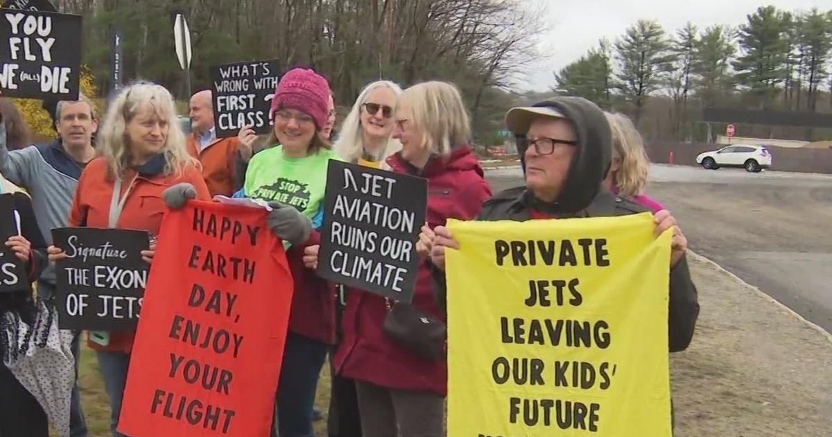 Climate change activists protest new private jet expansion at Massachusetts airport