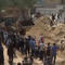 Over 200 bodies found in Gaza mass graves at hospital sites, Palestinian officials say