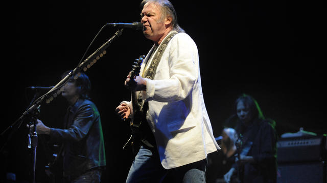 Neil Young preforms at Denver University's Magness Arena, promoting his new album, "Fork in the Road." Young delivered classics and songs from his new album in a two and a half hour show. Opening for Young was the Neville Brothers and Everest. Tim Rasmuss 