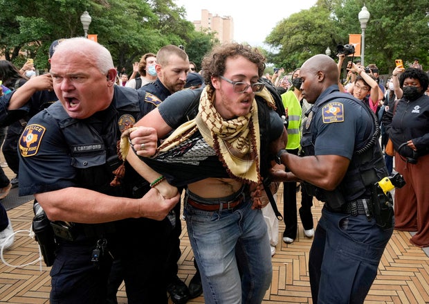 University of Texas police detain a man at a protest over Israel's war in Gaza at the University of Texas in Austin, Texas, April 24, 2024.