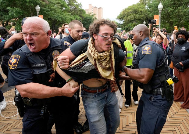 University of Texas police detain a man at a protest over Israel's war in Gaza at the University of Texas in Austin, Texas, April 24, 2024. 