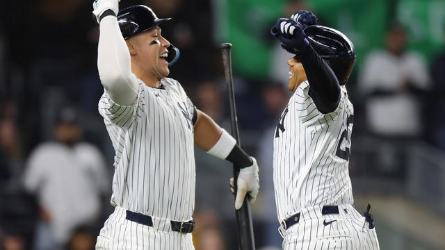 Juan Soto #22 of the New York Yankees (R) celebrates with Aaron Judge #99 after hitting a home run in the sixth inning against the Oakland Athletics at Yankee Stadium on April 24, 2024 in New York City. 