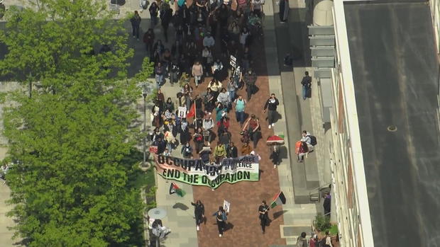Protesters march on the campus of Temple University 
