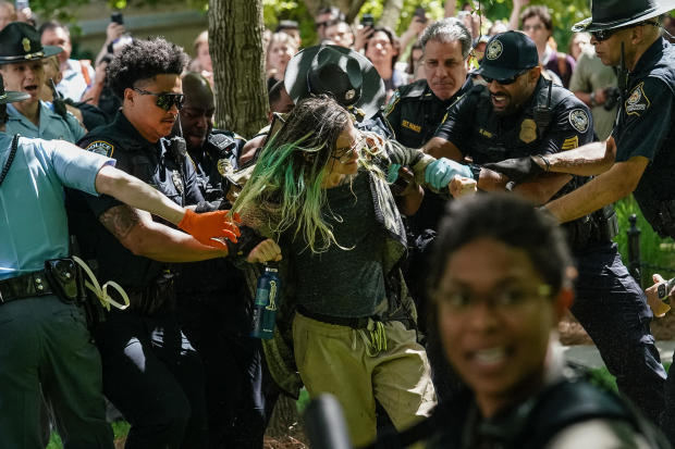 Police officers arrest a demonstrator during a protest against the war in Gaza at Emory University on April 25, 2024, in Atlanta, Georgia. 