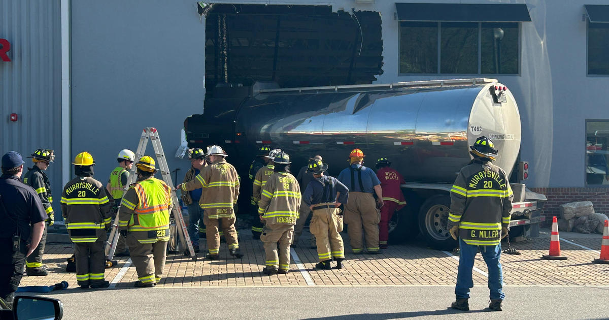 Water tanker truck driver crashes into Pittsburgh business