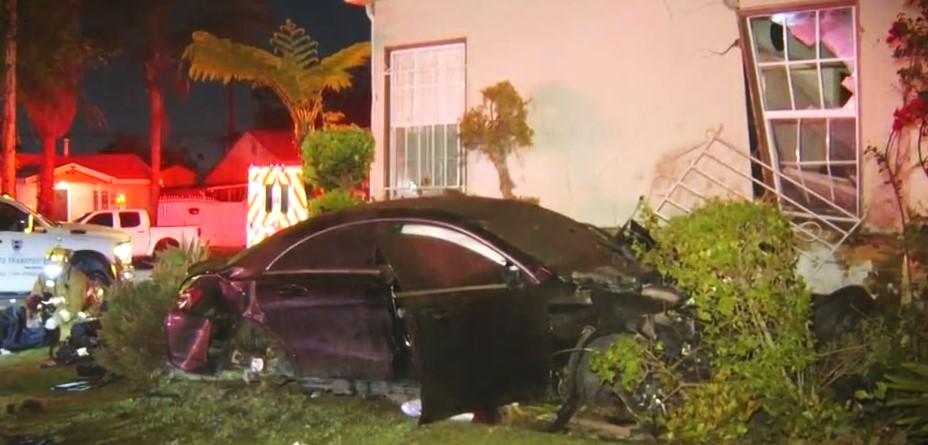 Two-car crash leaves 1 dead after car crashes into West Adams home ...