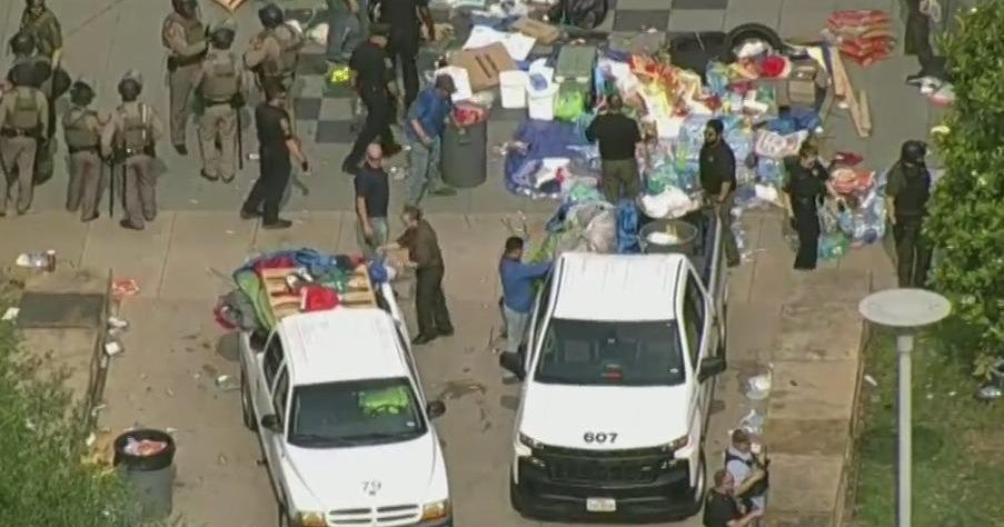 Law enforcement clearing protest encampments on UTD campus - CBS Texas