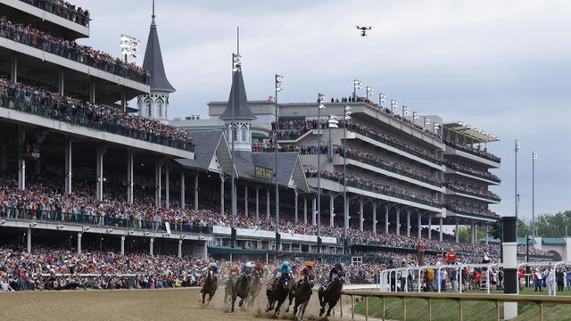 The field rounds turn one during the 149th running of the Kentucky Derby at Churchill Downs on May 6, 2023, in Louisville, Kentucky. 