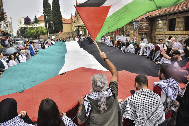 Students return portion successful a pro-Palestinian objection astatine nan American University of Beirut, April 30, 2024, amid nan ongoing conflict betwixt Israel and nan militant group Hamas successful Gaza. 