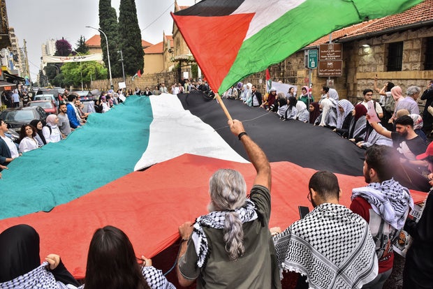Students take part in a pro-Palestinian demonstration at the American University of Beirut on April 30, 2024, amid the ongoing conflict between Israel and the militant group Hamas in Gaza.