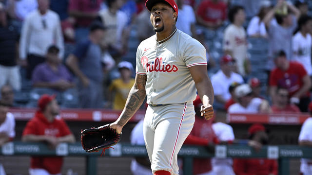 Philadelphia Phillies relief pitcher Gregory Soto celebrates after Los Angeles Angels' Taylor Ward flies out to left field during the ninth inning of a baseball game in Anaheim, California. 