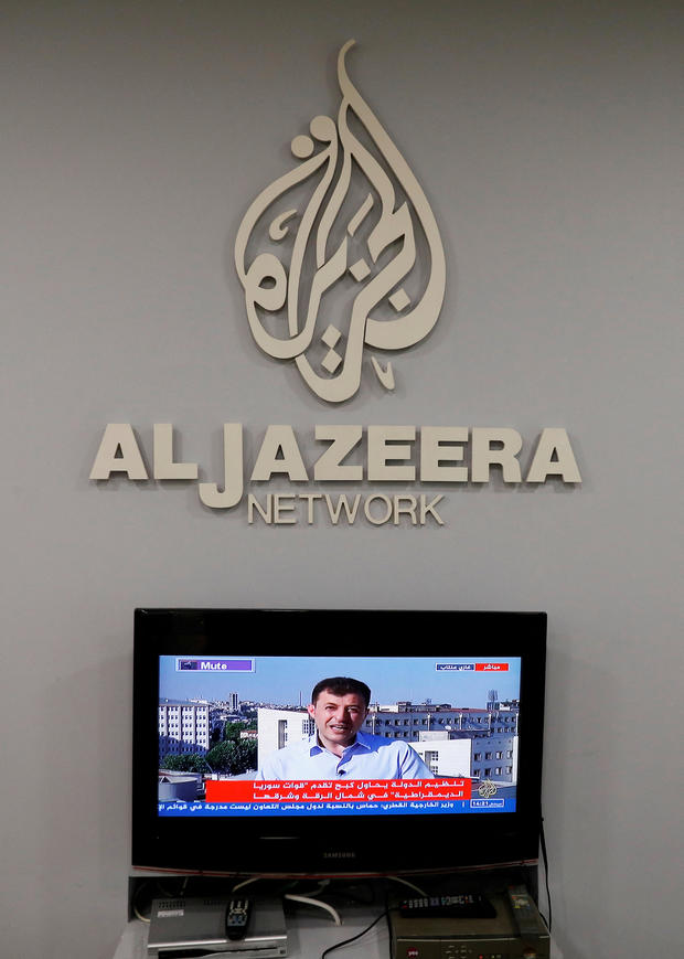  The logo of Qatar-based Al-Jazeera web is seen successful 1 of their offices successful Jerusalem 