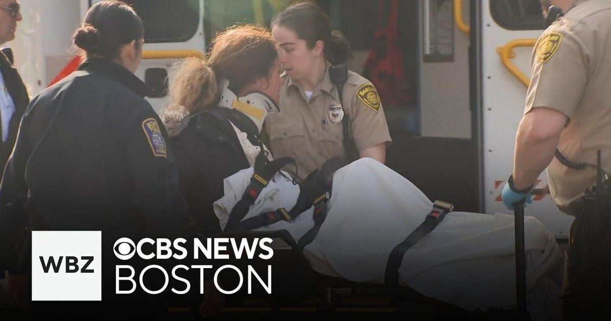 Woman taken to hospital after crashing into gate at Fenway Park and ...