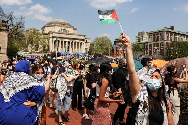 Students march and rally on Columbia University's campus in support of a protest encampment supporting Palestinians, despite a deadline issued by university officials to disband or face suspension, in New York City, April 29, 2024. 