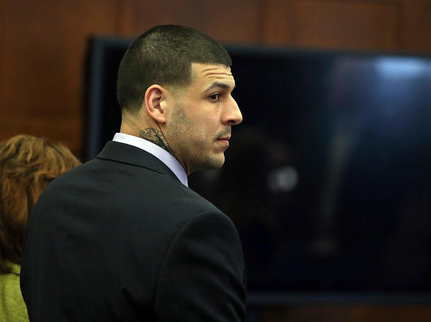 (041317 Boston, MA) Former New England Patriots tight end Aaron Hernandez stands at the defense table when court is adjourned without a verdict on day 5 of jury deliberations in his double murder trial at Suffolk Superior Court on Thursday, April 13 