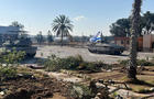 FILE PHOTO: Israeli military vehicles operate in the Gazan side of the Rafah Crossing 