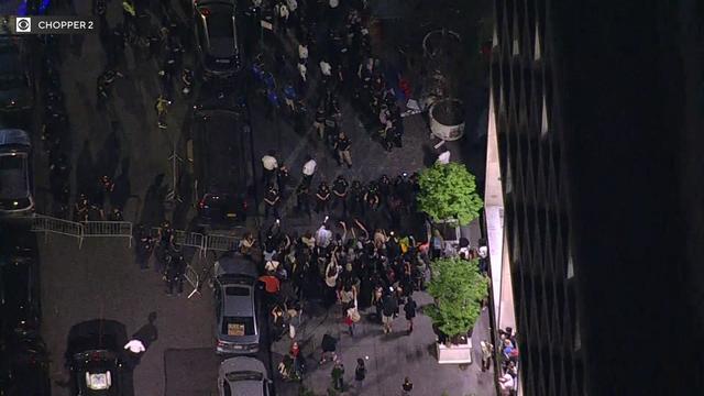 An aerial view of demonstrations and police gathered outside New York City's Fashion Institute of Technology. 