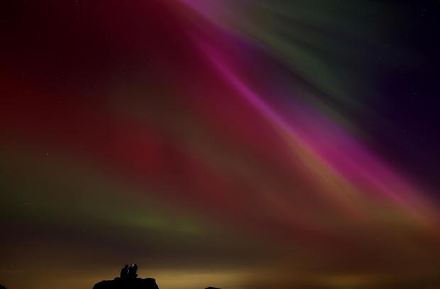The aurora borealis, also known as the 'northern lights', are seen over The Roaches near Leek 