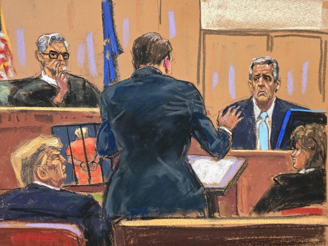 Michael Cohen faces questions from Todd Blanche at former President Donald Trump's criminal trial in New York on Tuesday, May 14, 2024. 