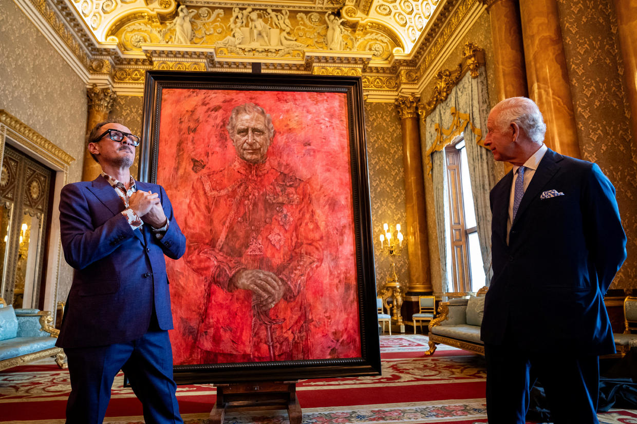 King Charles III’s bright red official portrait raises eyebrows