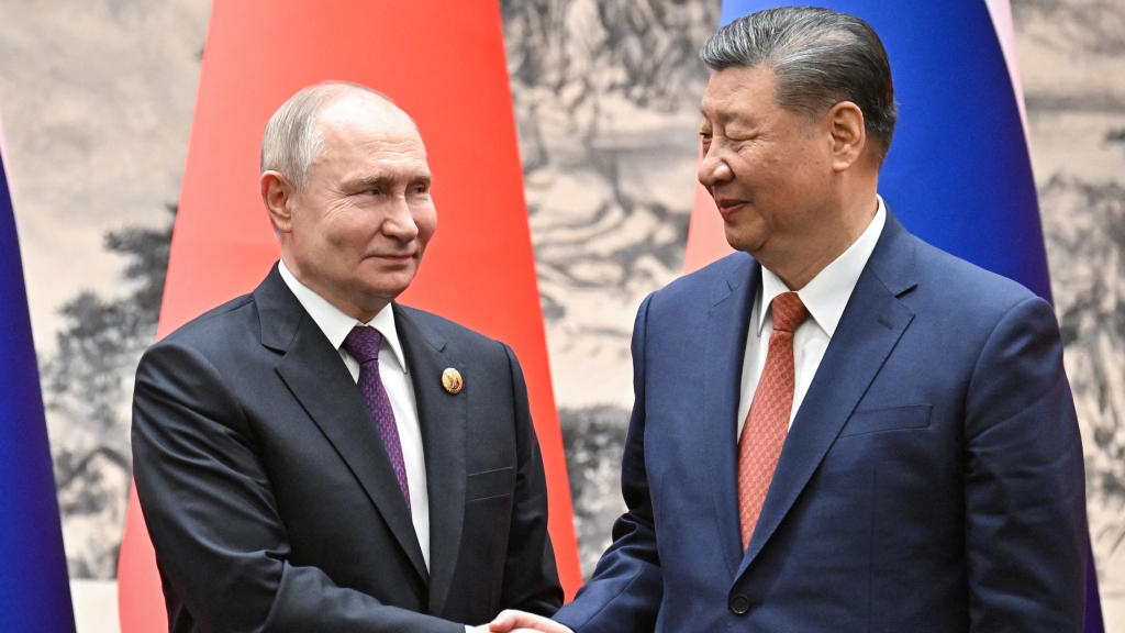Putin visits Beijing as Russia and China stress "no-limits"
relationship amid tension with the U.S.