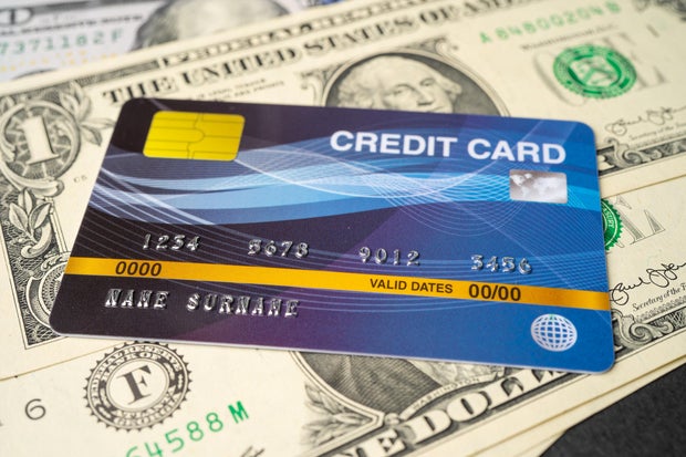 Credit card model on US dollar banknotes, Finance development, Banking Account, Statistics, Investment Analytic research data economy, Stock exchange trading, Business company concept.