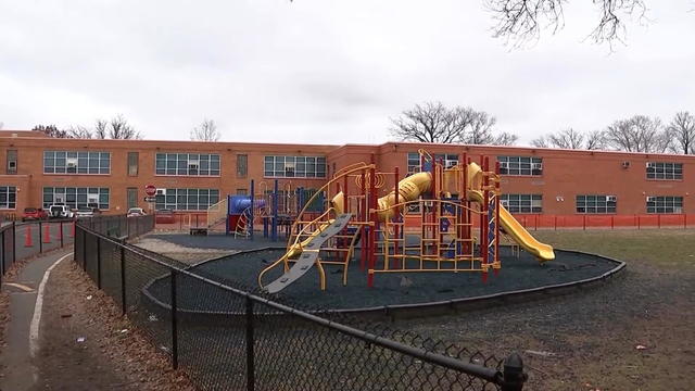 A playground is seen in front of a school in Trenton, New Jersey 