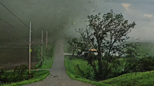 Powerful storms generate more tornadoes and flood the Midwest