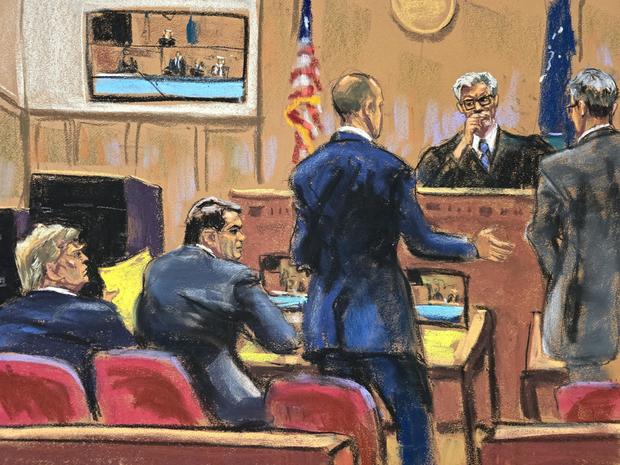 Emil Bove, standing on the left, and Matthew Colangelo, right, argue before Justice Juan Merchan at former President Donald Trump's trial in New York on Tuesday, May 21, 2024. 